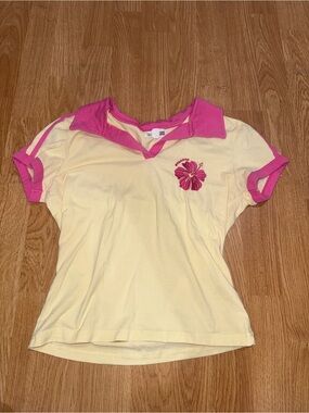 Girls Yellow Polo Top with Pink Trim and Hibiscus Embroidery